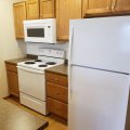Built in microwave, plenty of electric nearby.  We tiled behind the stove for easy cleaning.