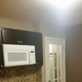 7427 kitchen stove area with door